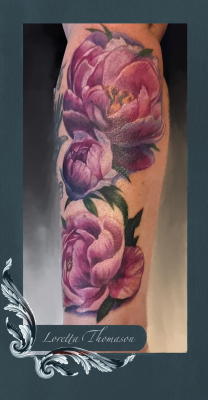 Loretta Thomason roses colour tattoo