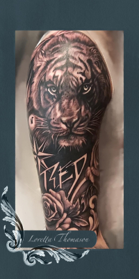 Loretta Thomason tiger tattoo